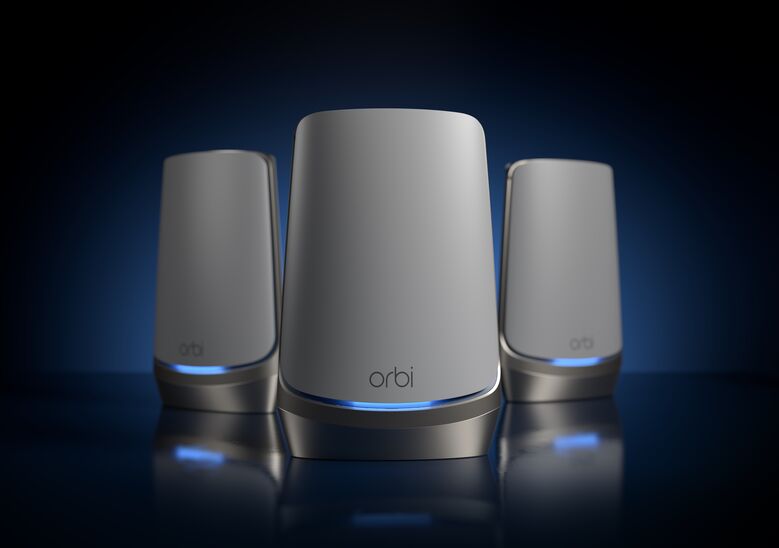 A NETGEAR Orbi Mesh WiFi System, pictured with its Router and Mesh Satellites.