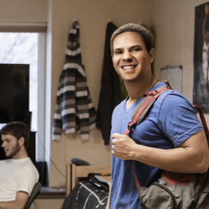 Man with a backpack smiling