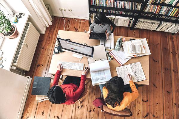 People working on a table