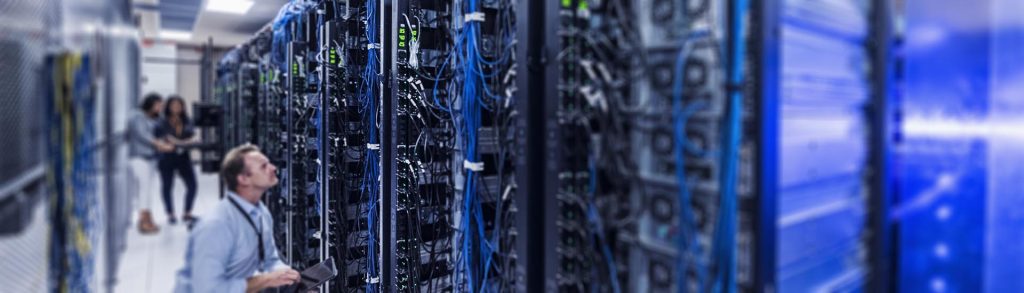 man looking at the servers