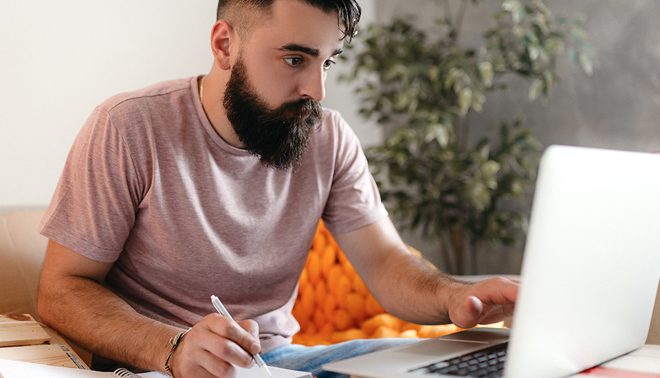 man using laptop protecting router